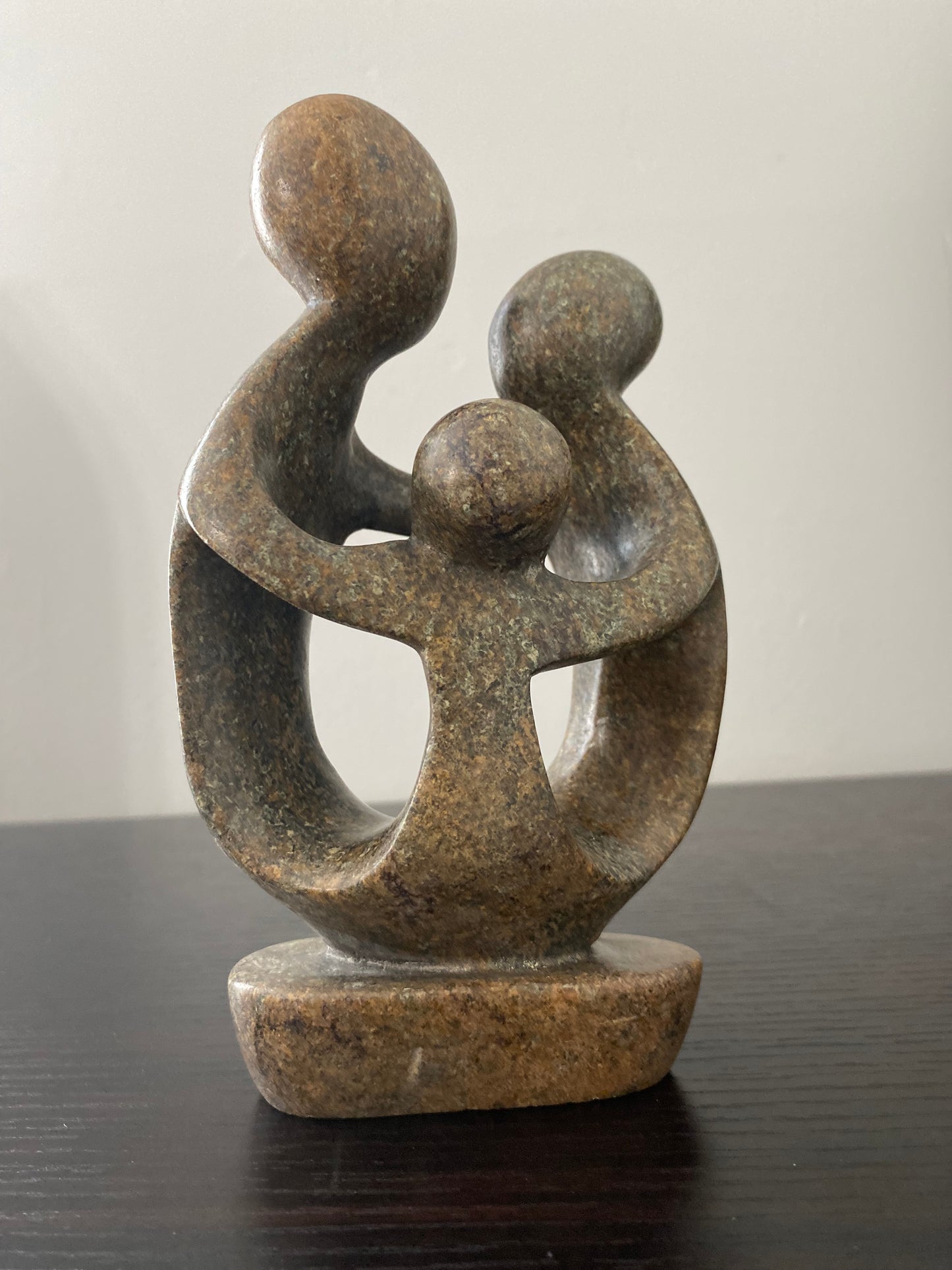 Stone Sculpture of a family of 3