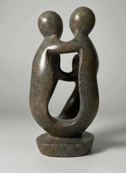 family of 4 stone sculpture