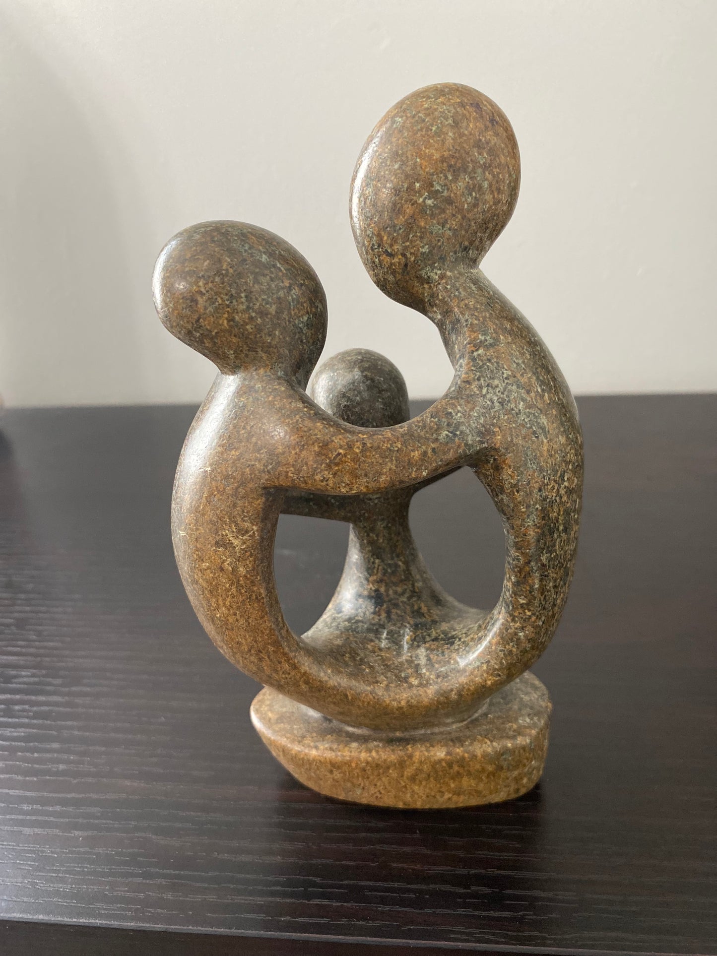 Stone Sculpture of a family of 3