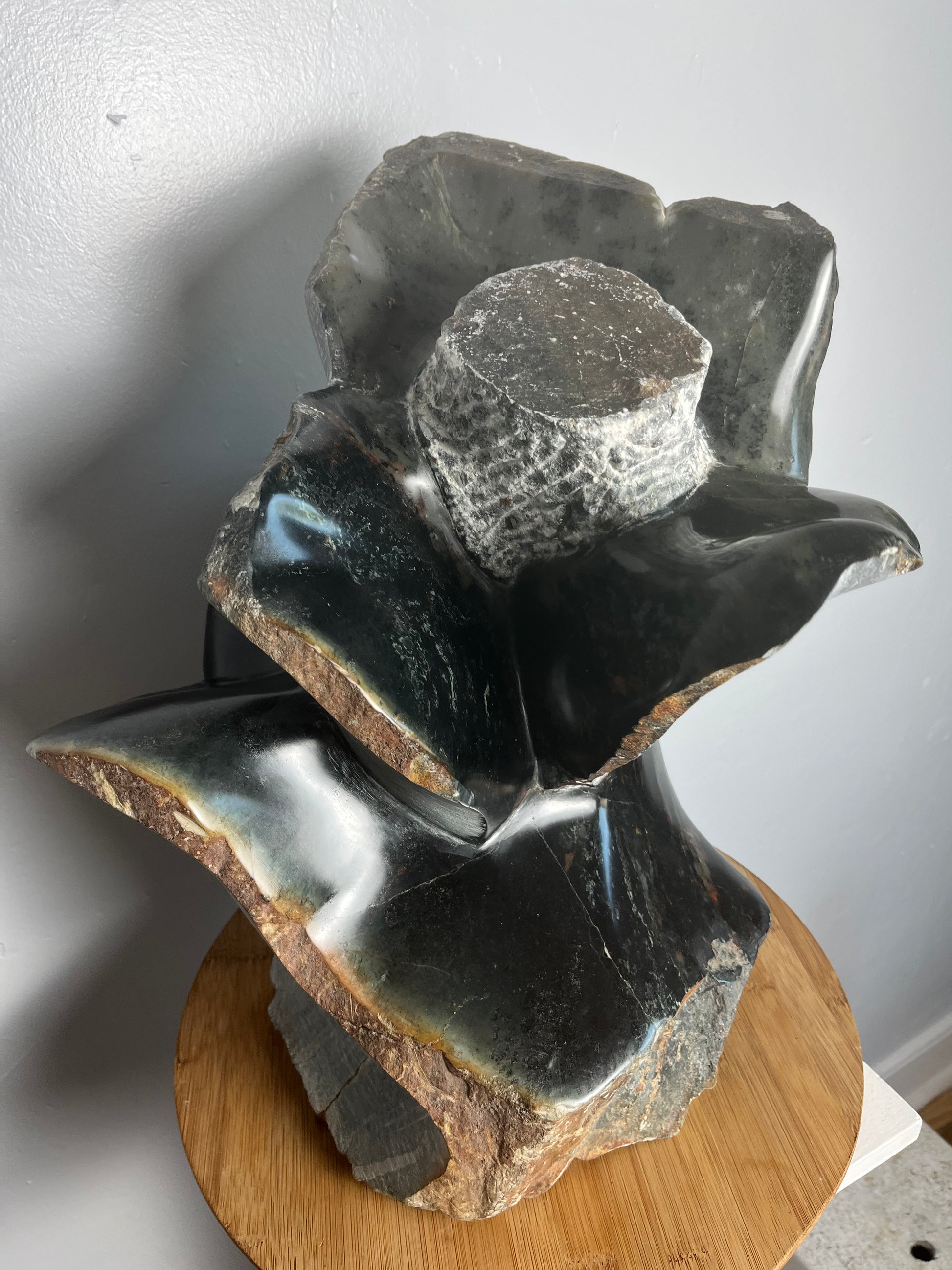 Stone flower sculpture by artist Dawson Chivazhe