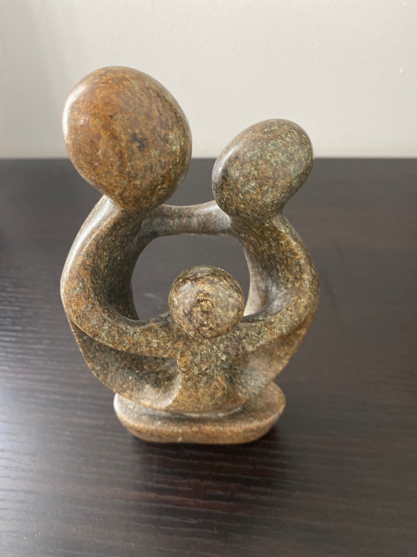 Stone Sculpture of a family of 3
