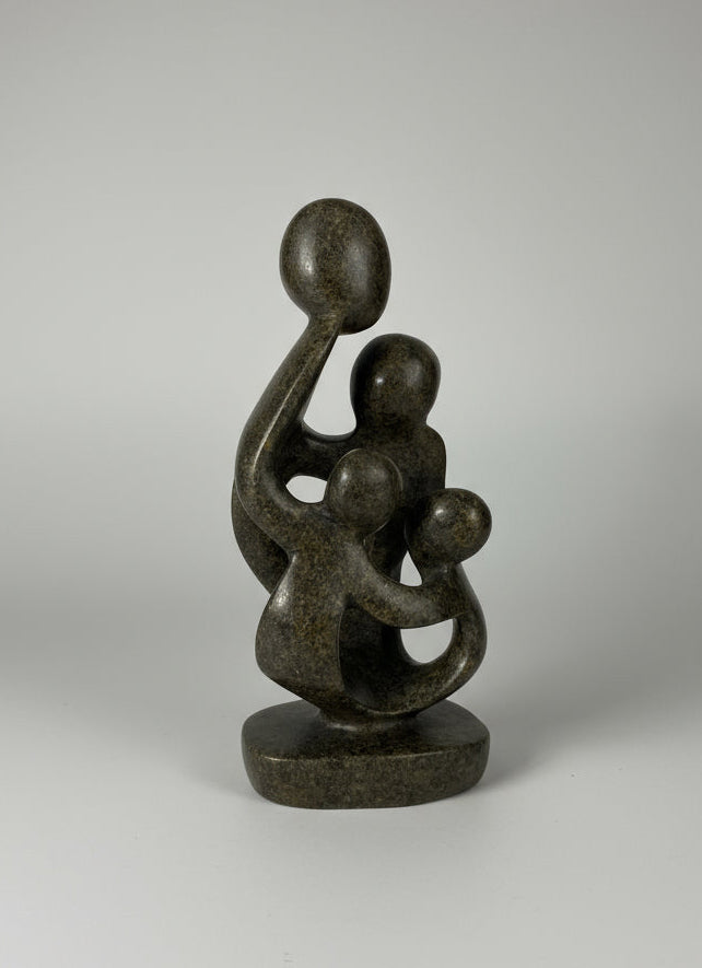 Family of 4 stone sculpture