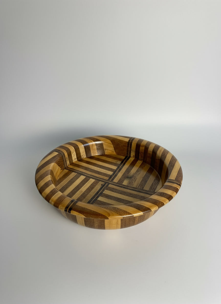 Wooden tray with striped pattern on a white background