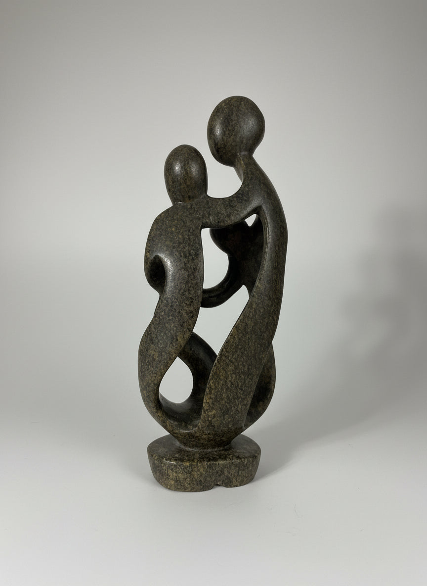 Back of Stone Sculpture family of 4