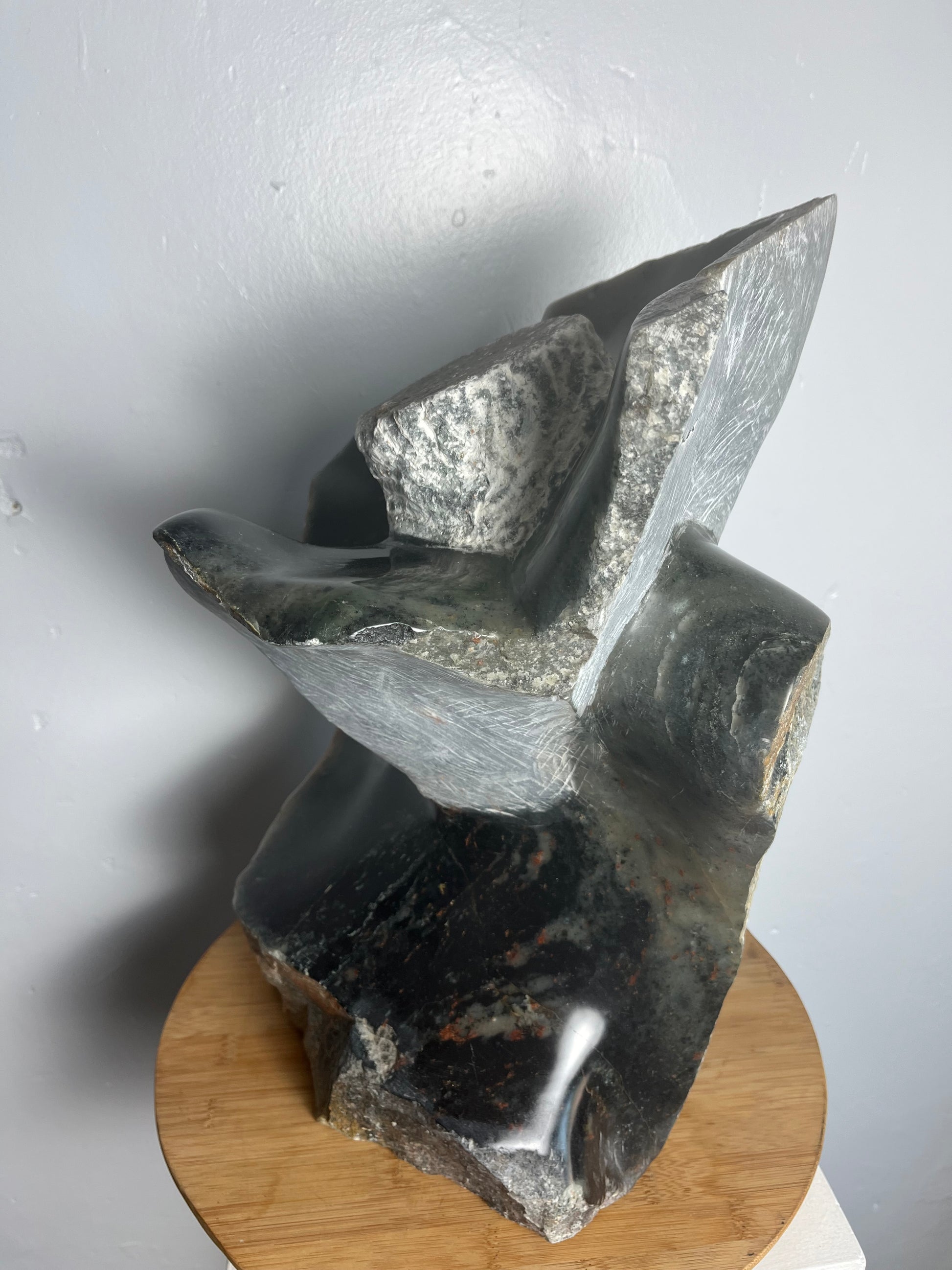 Stone flower sculpture by artist Dawson Chivazhe