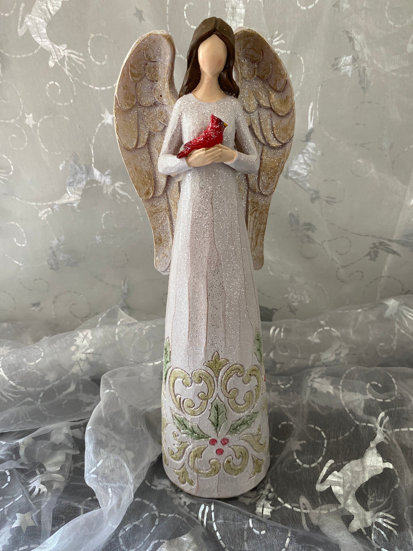 Angel Holding a Cardinal Sparkles