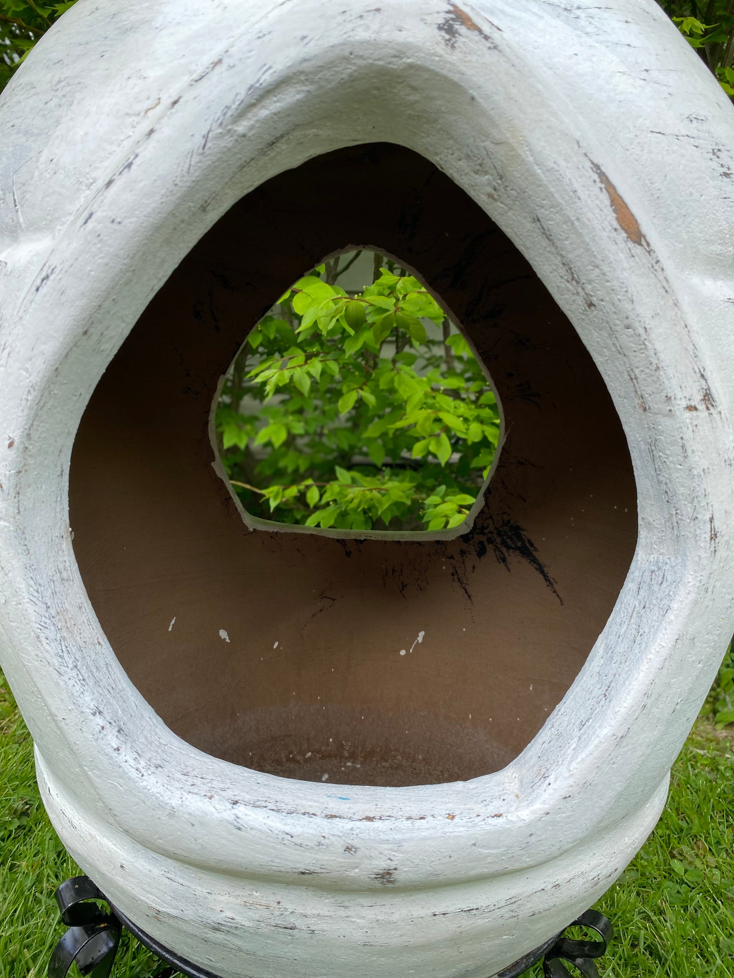 white chiminea with 2 openings