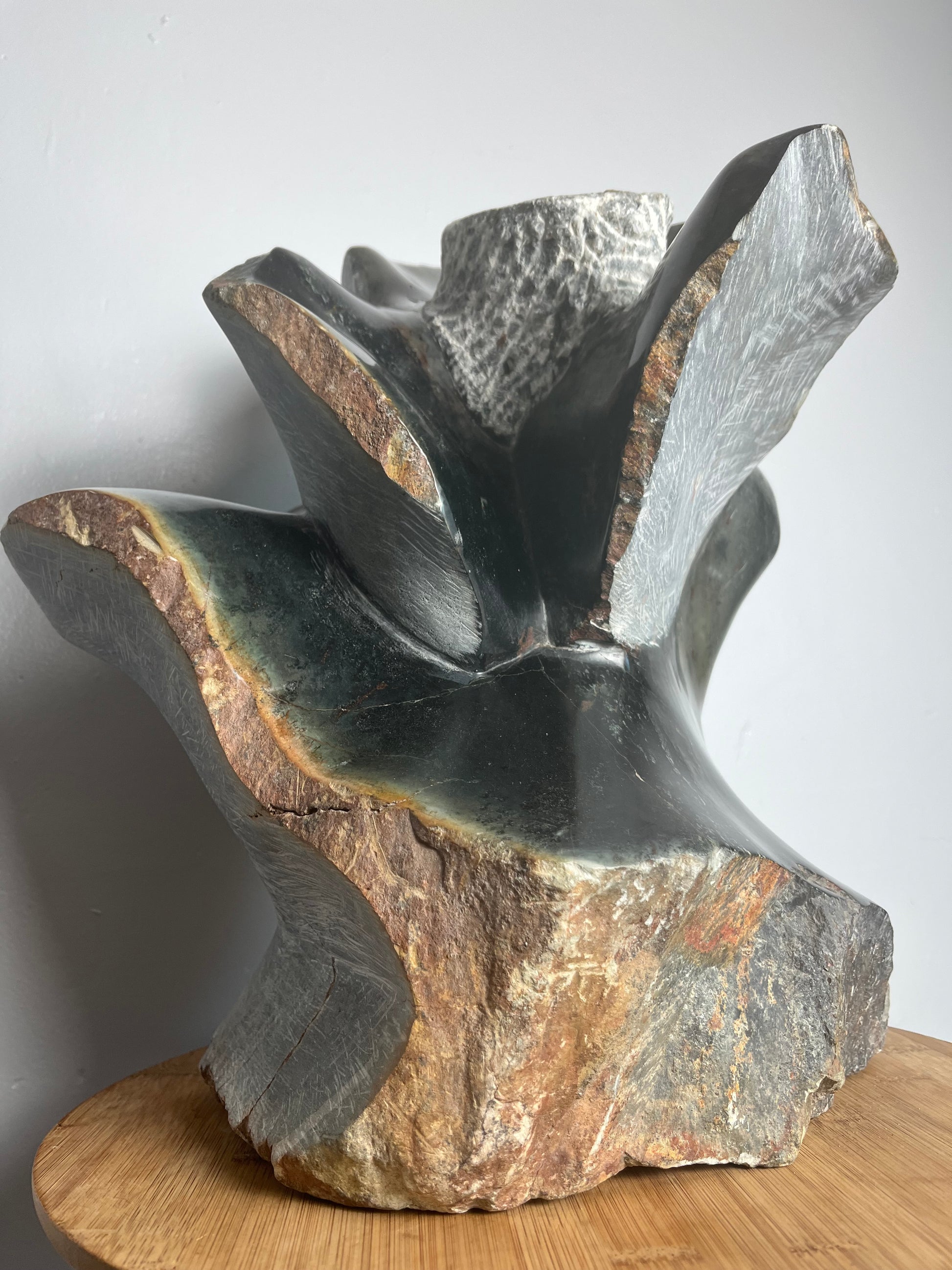 Stone flower sculpture by artist Dawson Chivazhe