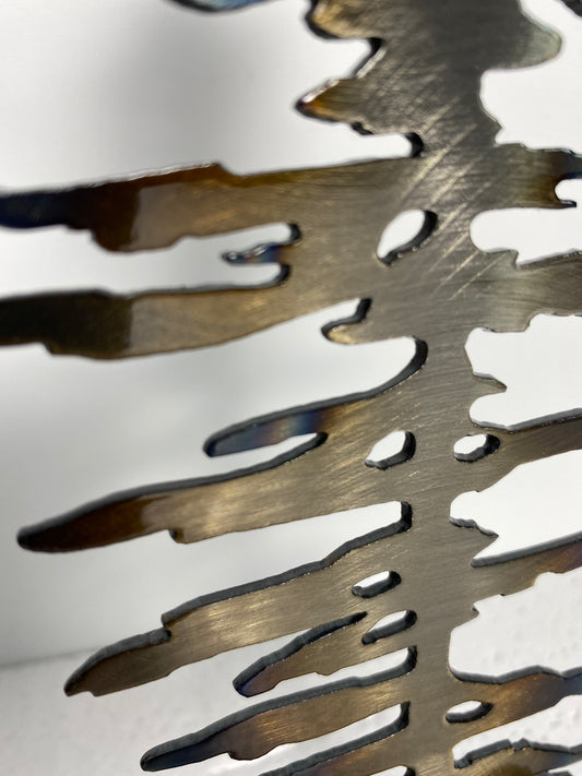 skinny metal tree on base