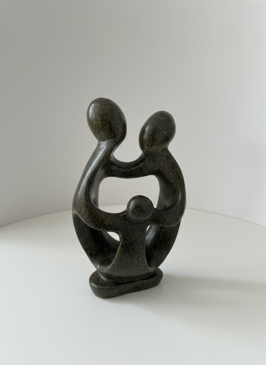 family of 3 stone sculpture
