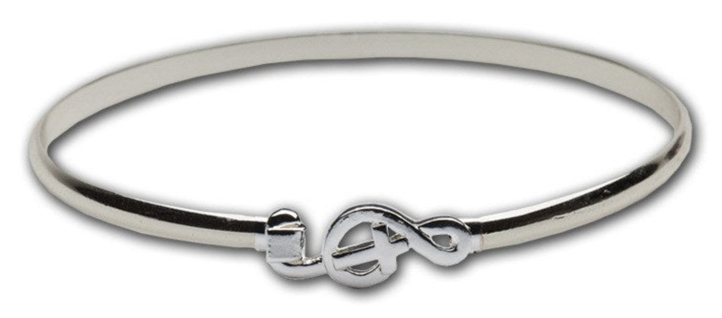 Silver bracelet with a music note design on a white background