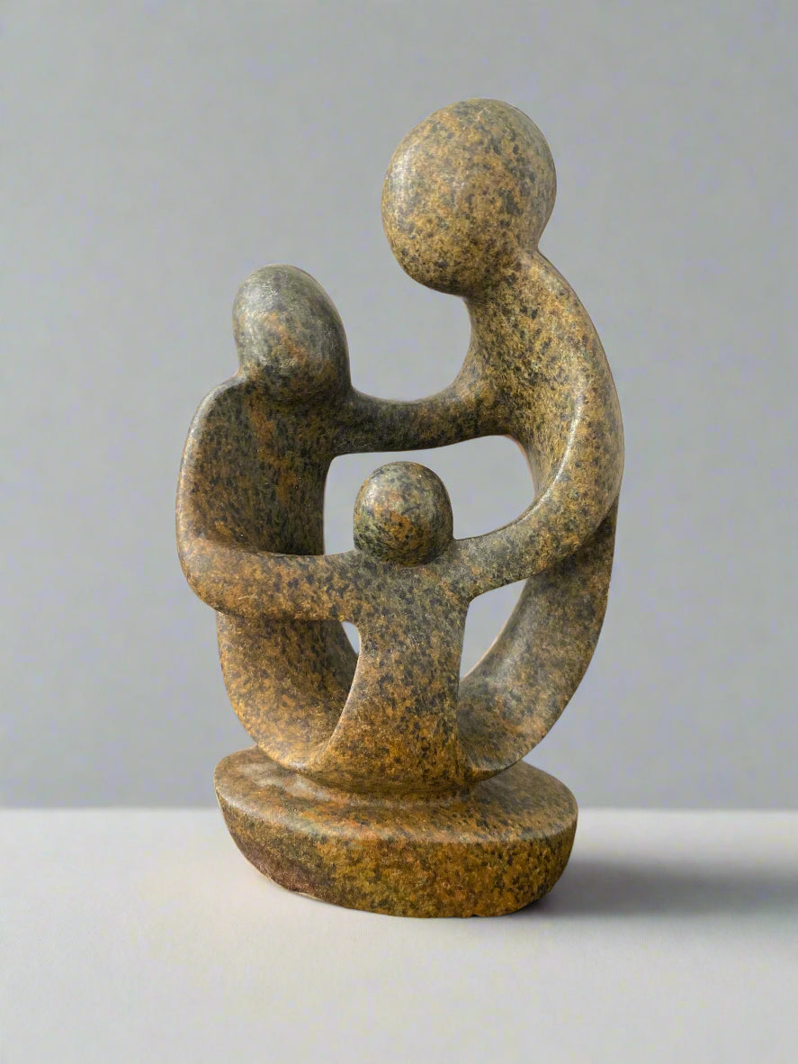 Stone Sculpture of a family of 3