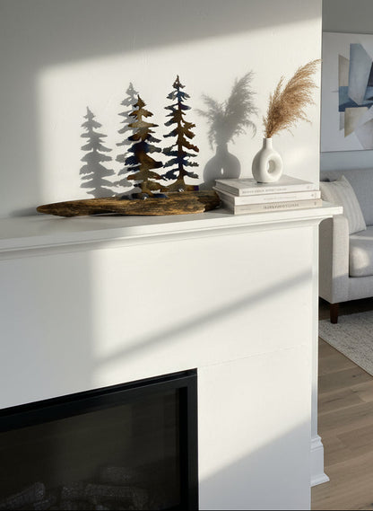 Metal trees on a wood base