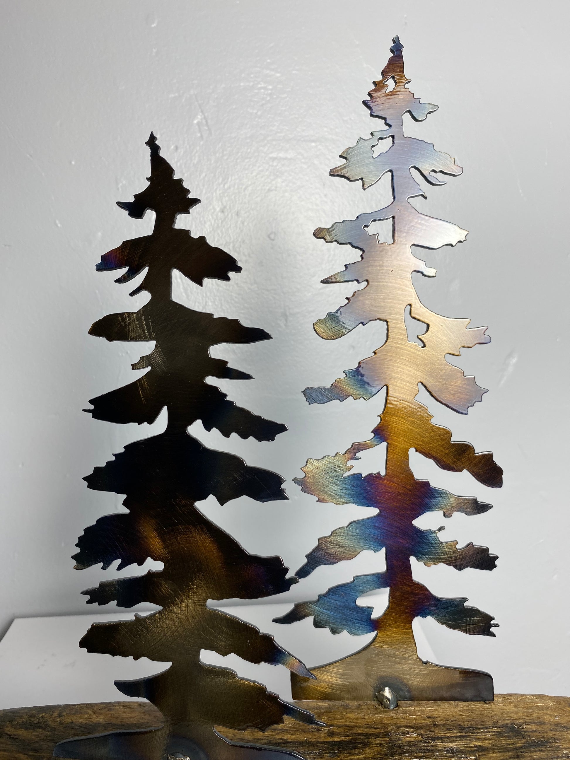 Metal trees on a wood base