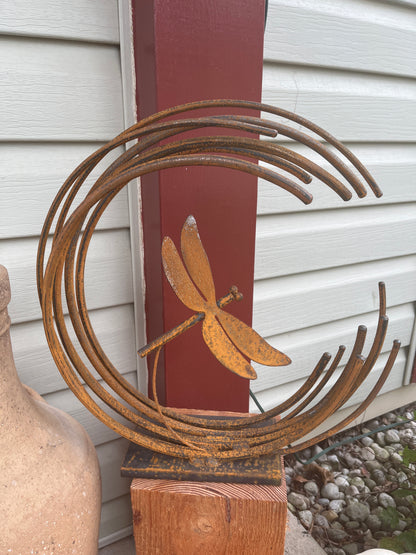 Metal dragonfly arc