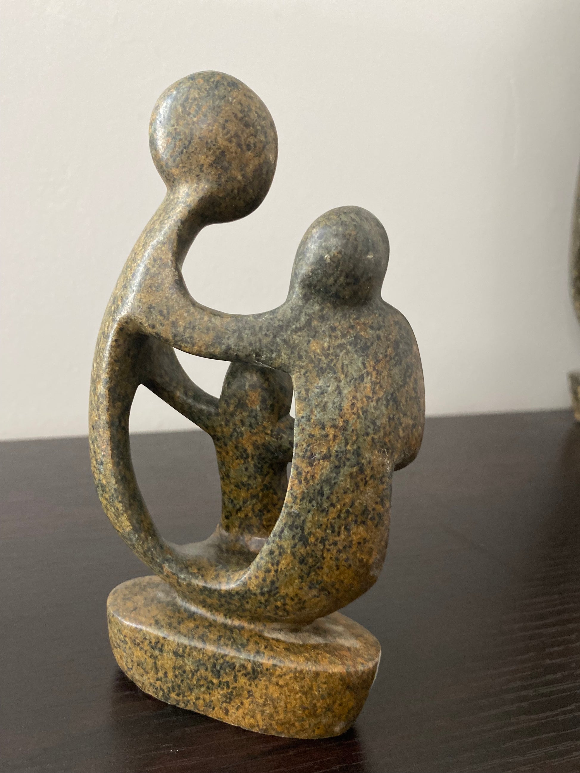 Stone Sculpture of a family of 3