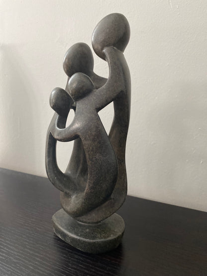 Stone sculpture from Zimbabwe of a family of 4