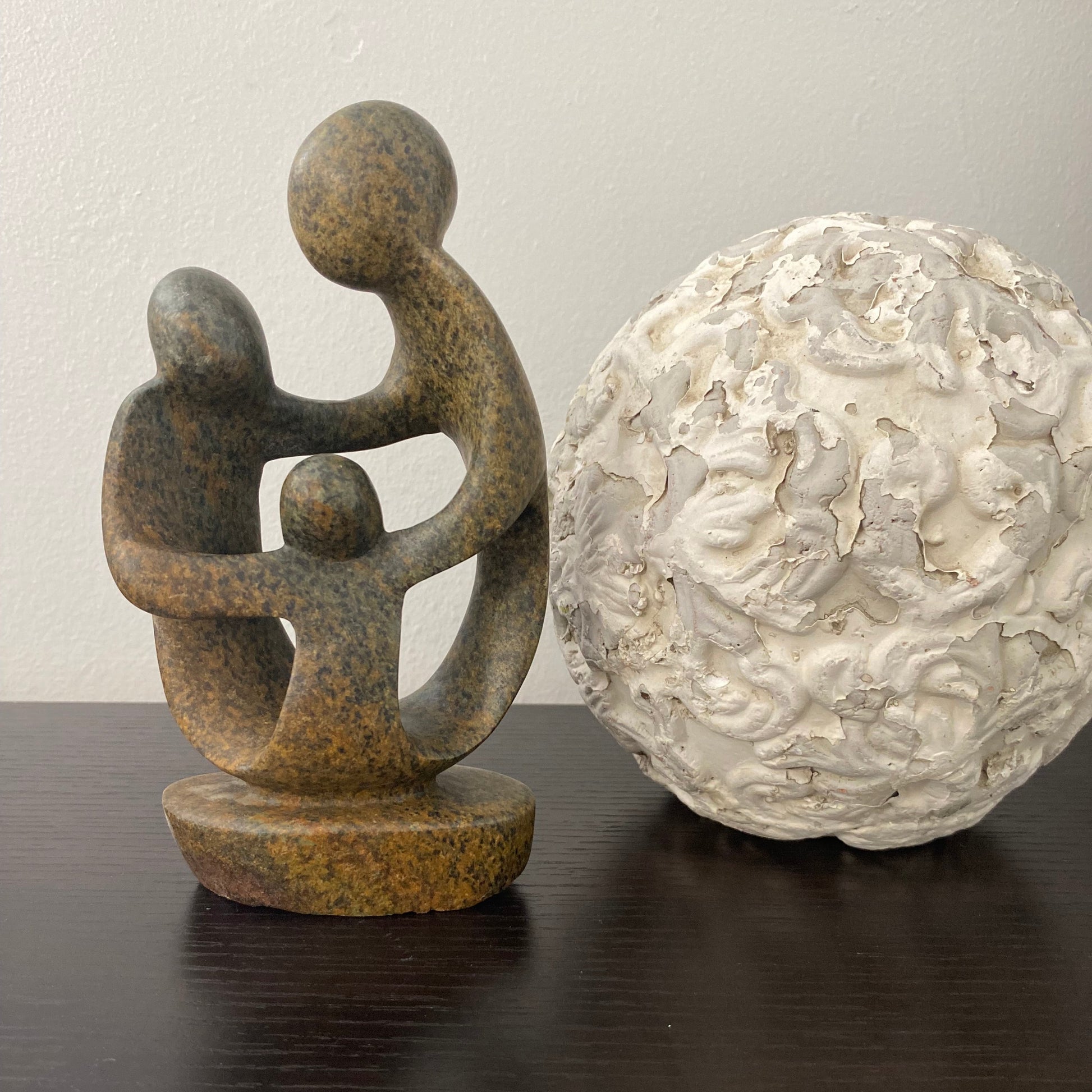 Stone Sculpture of a family of 3