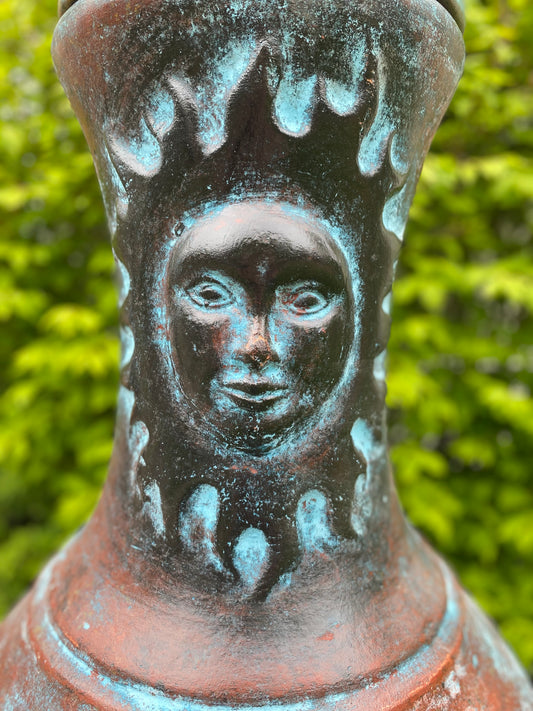 Traditional mexican chiminea top view design of a flaming sun