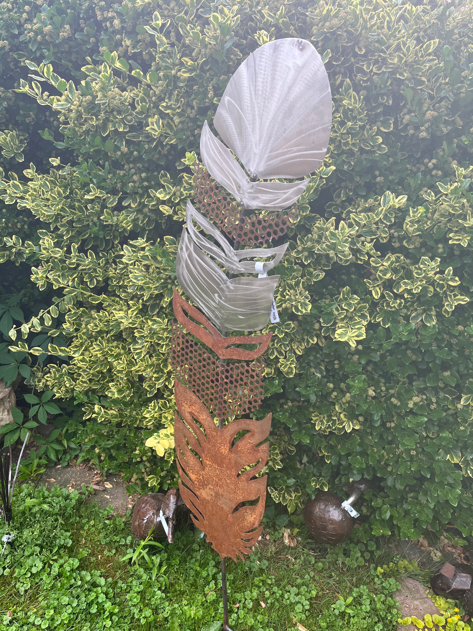 Metal garden feather