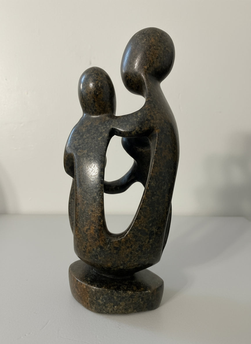 Family of 4 Stone Sculpture back view