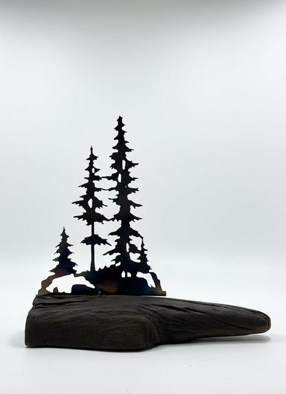 Metal trees on Canadian drift wood