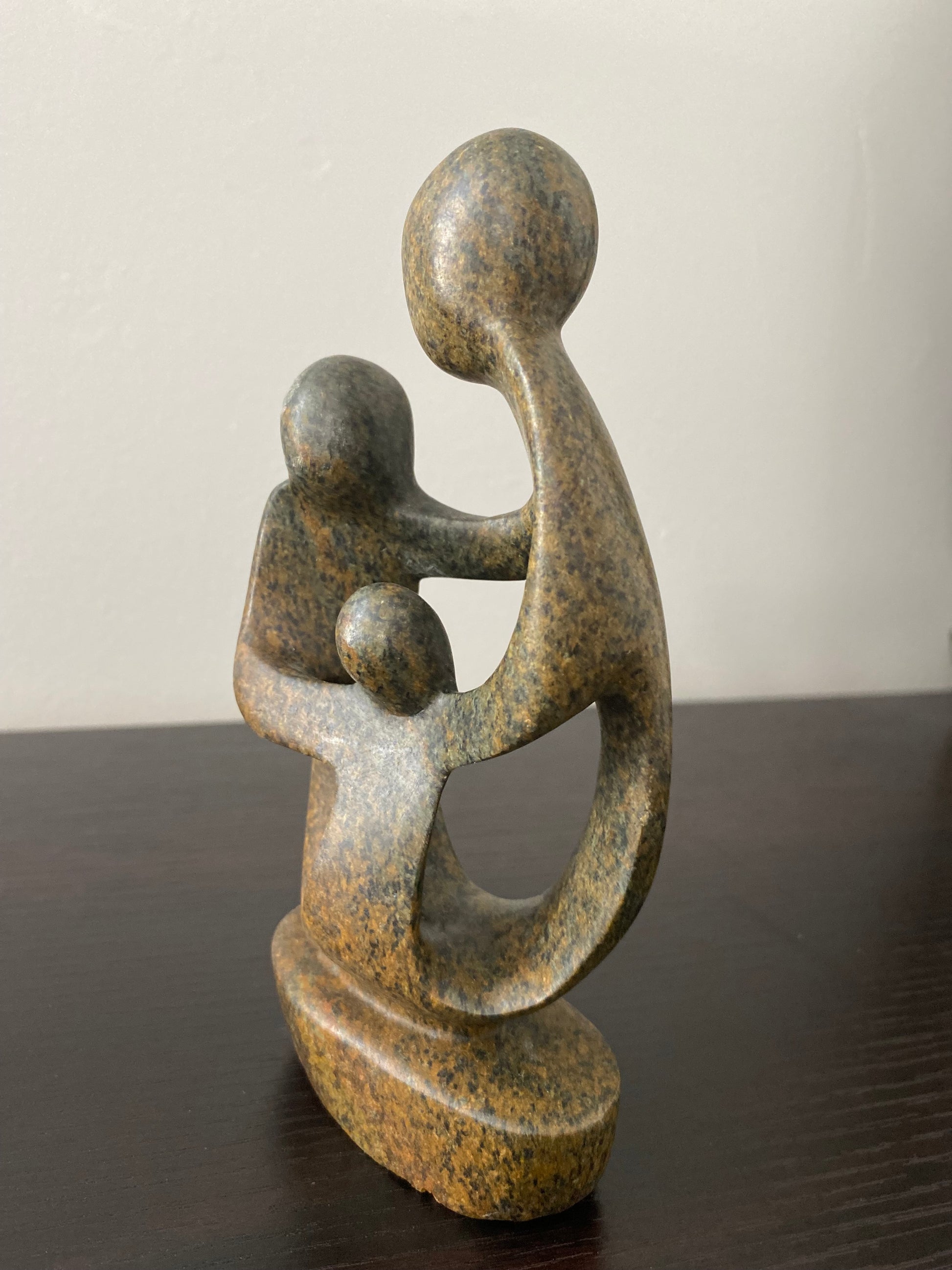 Stone Sculpture of a family of 3