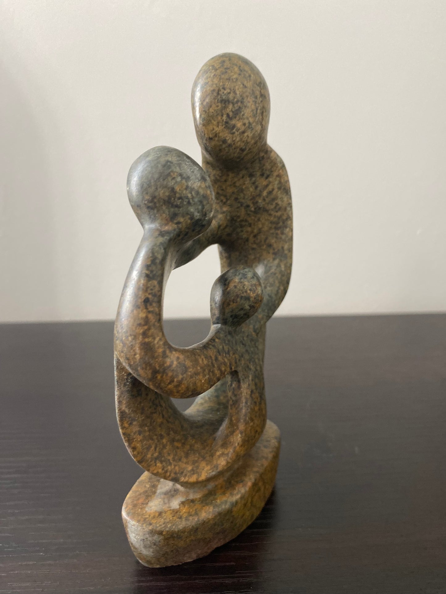 Stone Sculpture of a family of 3