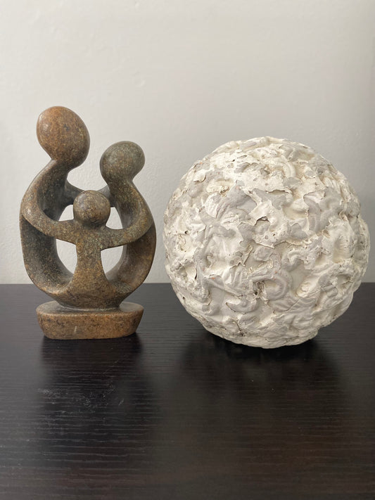 Stone Sculpture of a family of 3