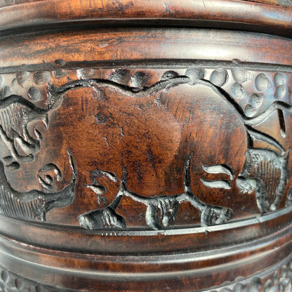 Rhino carving in wood jar