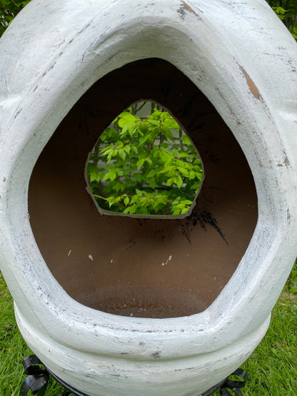 white chiminea with 2 openings