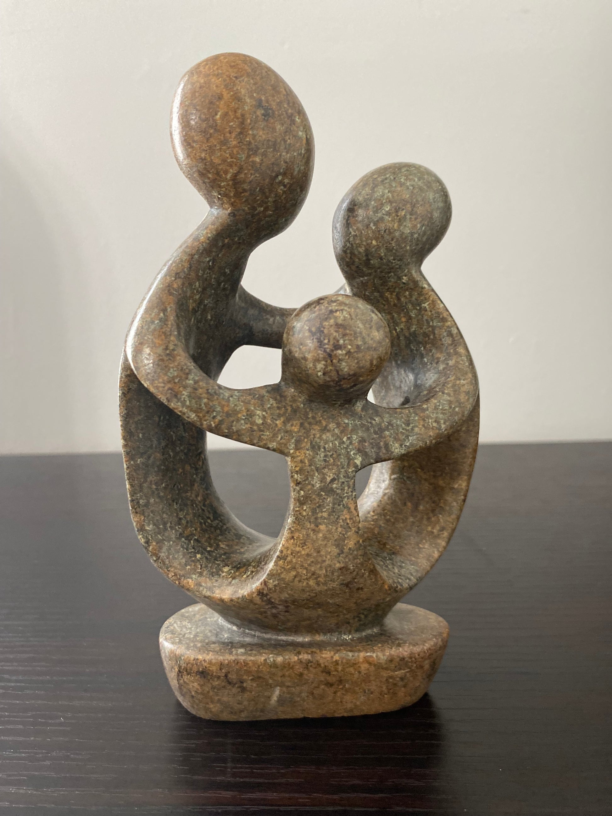 Stone Sculpture of a family of 3