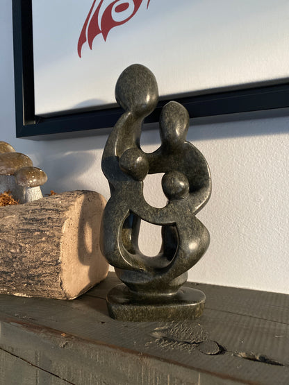 Family of 4 stone sculpture