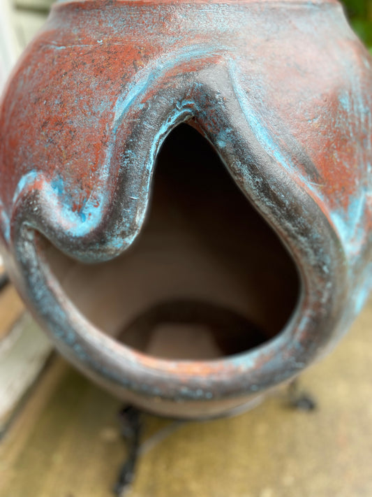 Opening of flame chiminea