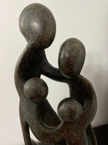 Close up of Zimbabwe sculpture - family of 4