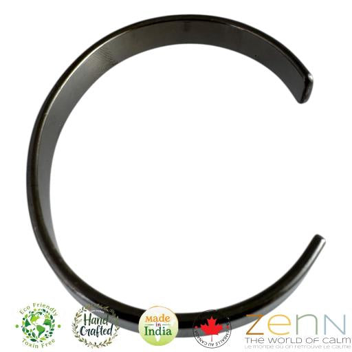 Black metal bracelet on a white background with 'Zenn' branding.