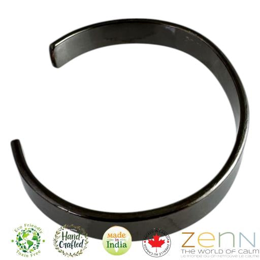 Black metal bangle on a white background with Zenn India branding.
