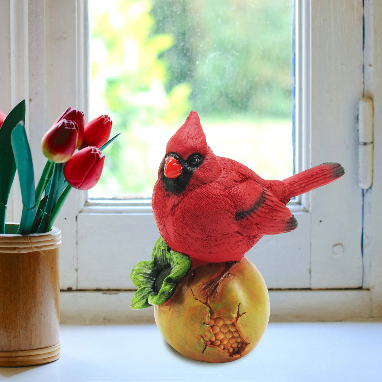 Cardinal on fruit figurine