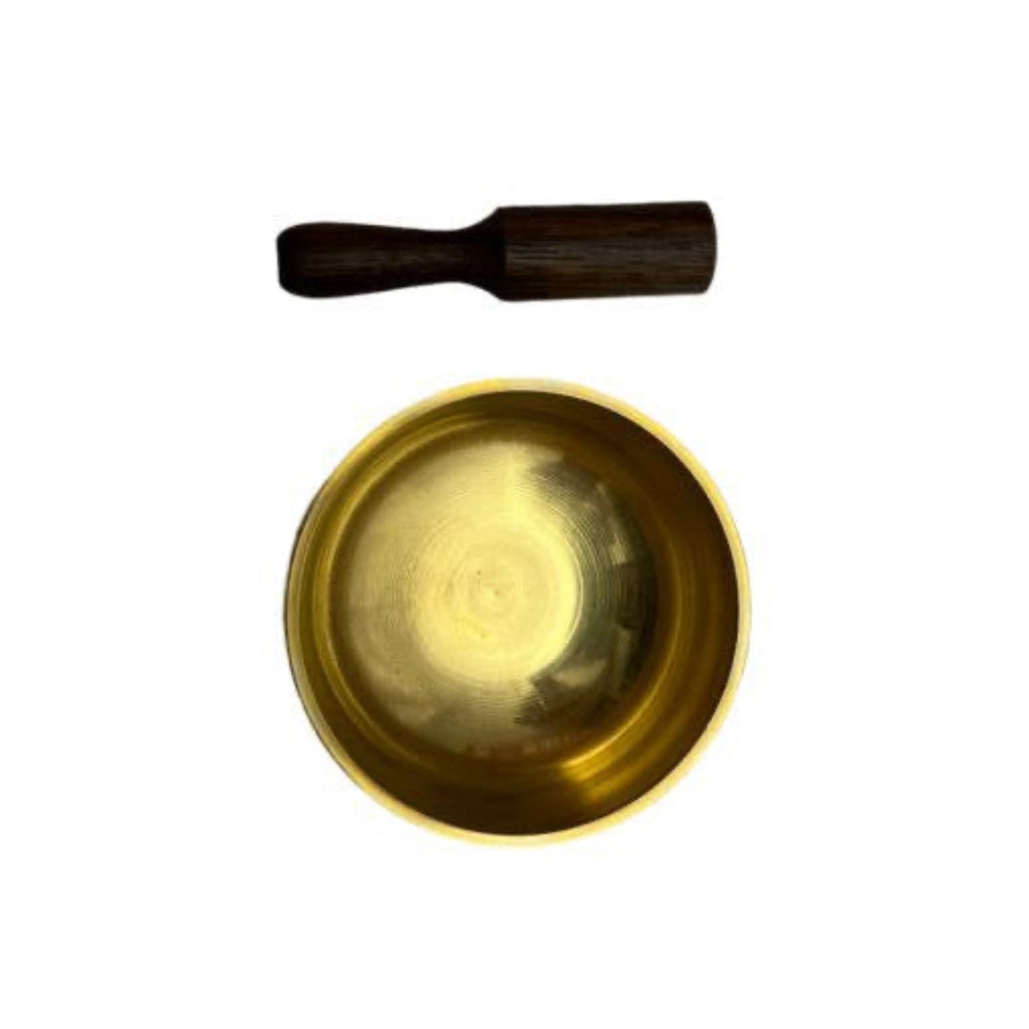 Brass singing bowl with wooden mallet on a white background