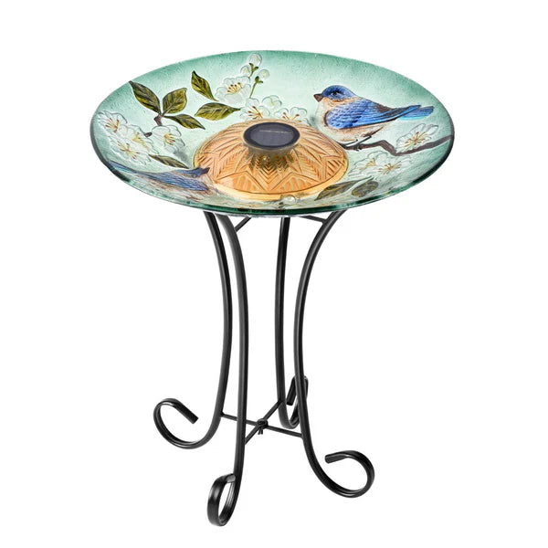 Glass blue bird and peach blossom bird bath