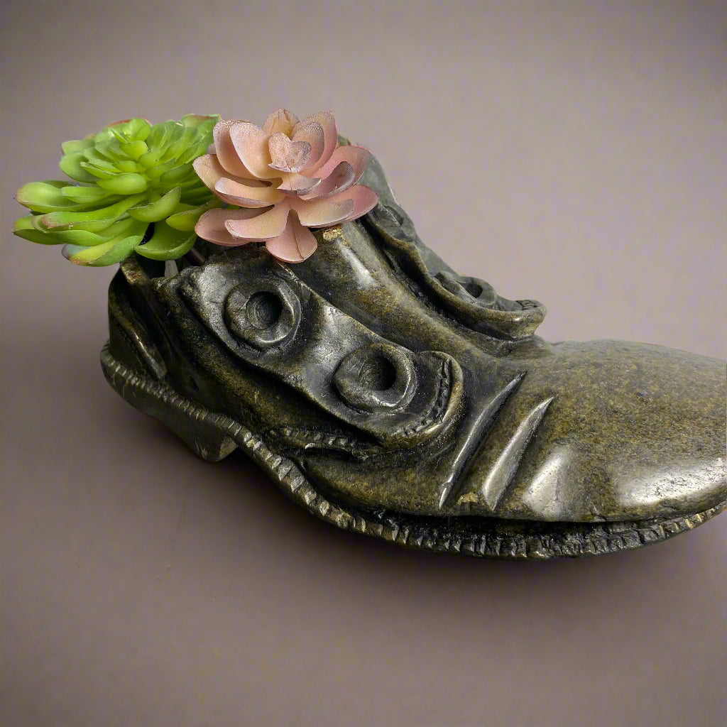 Succulent garden idea in stone shoe