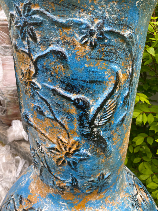 Chiminea made in Mexico with hummingbirds side view