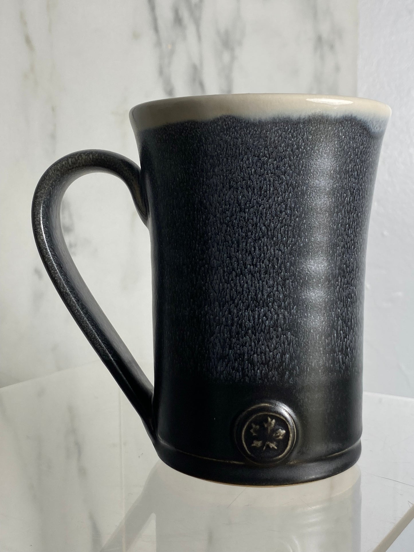 Handmade pottery medallion mug