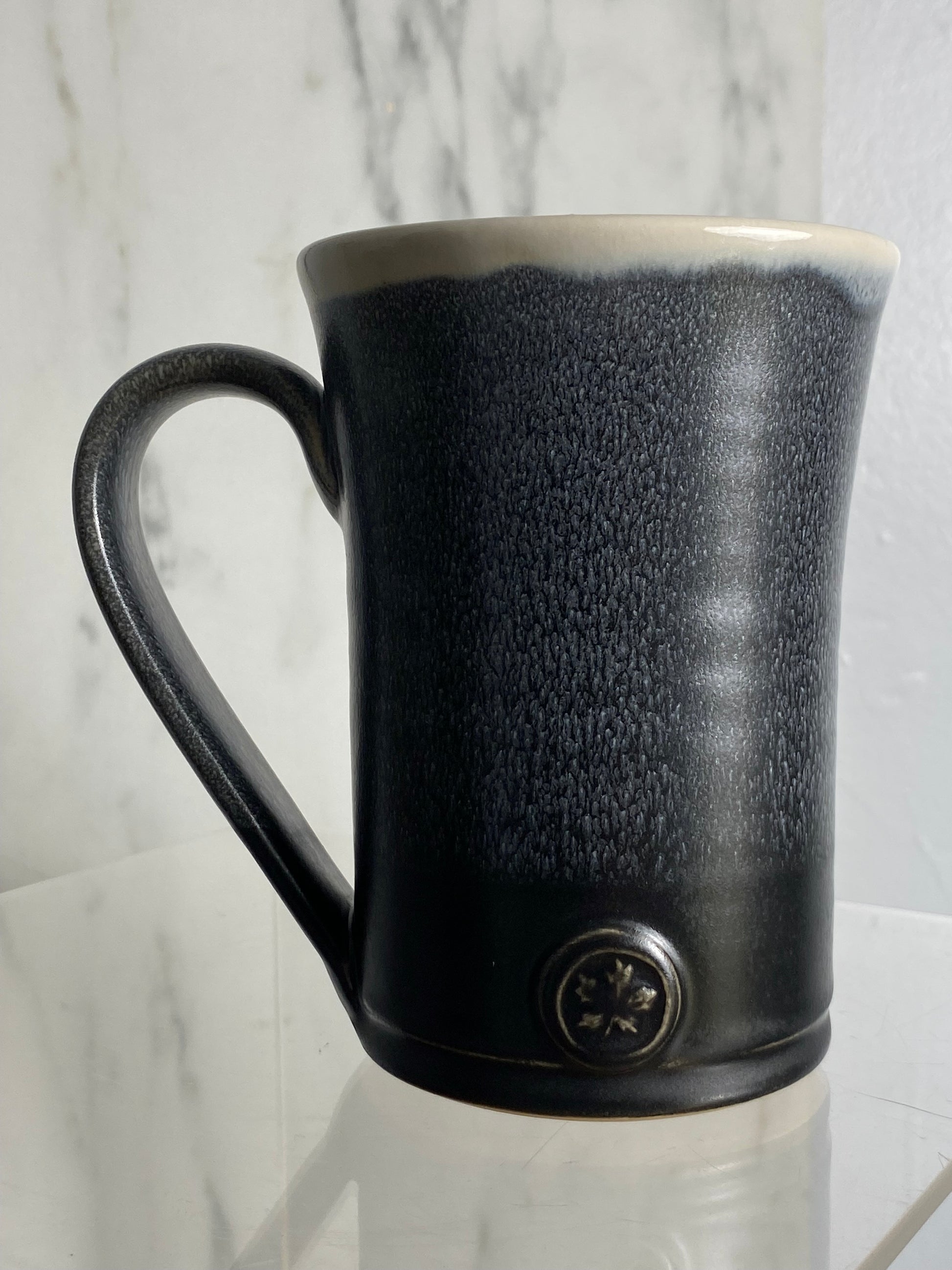 Handmade pottery medallion mug