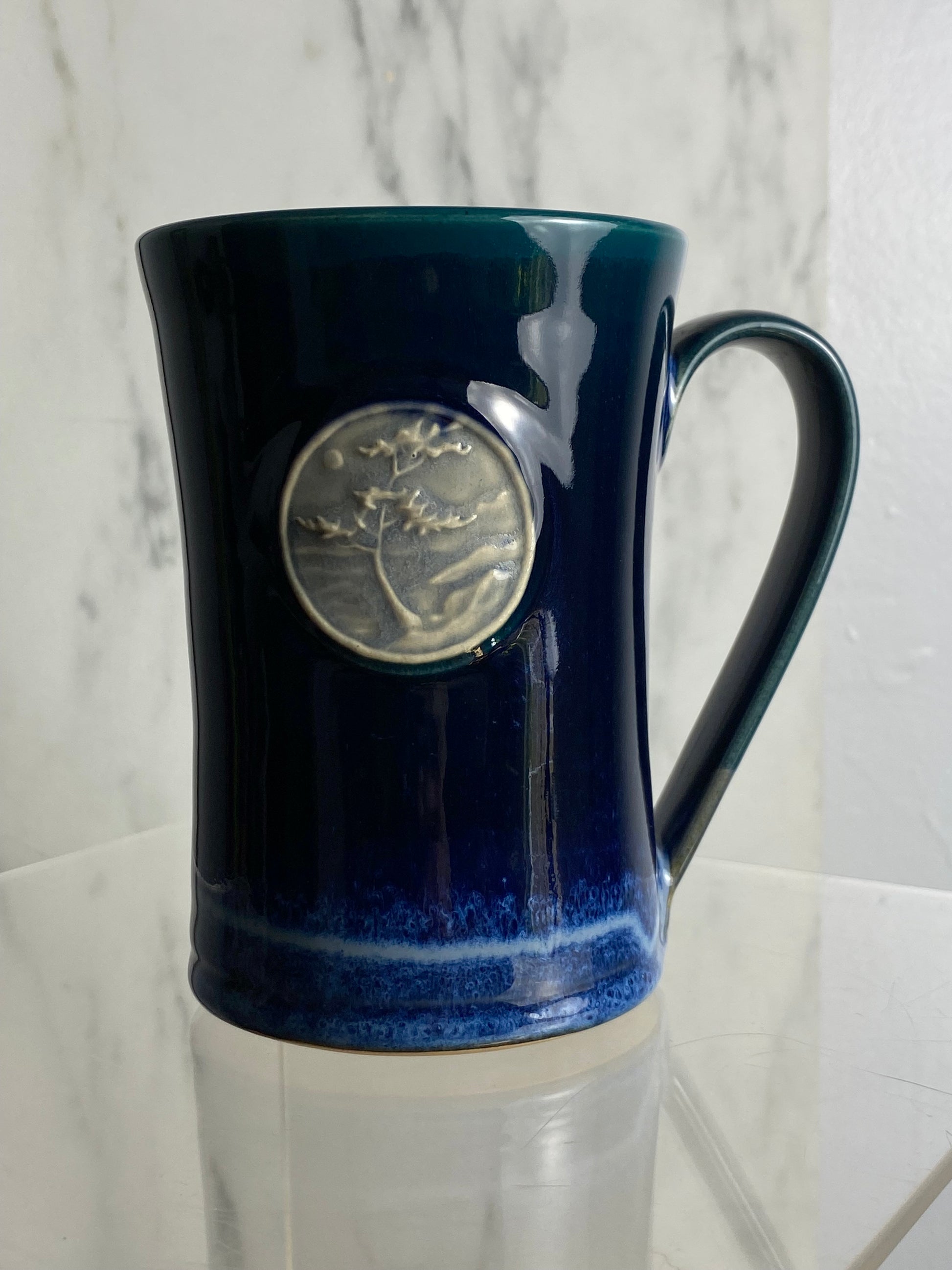 Handmade pottery medallion mug