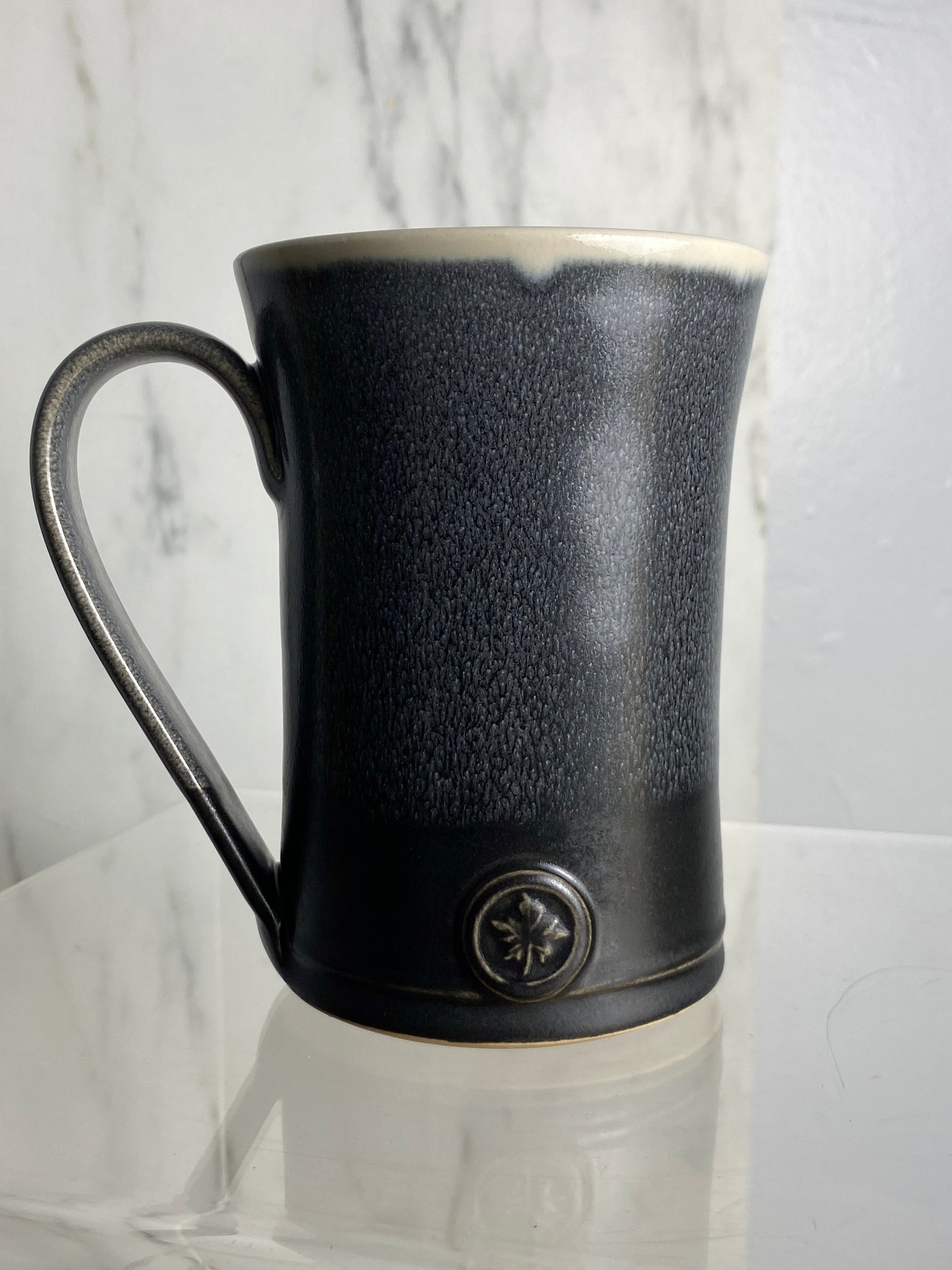 Handmade pottery medallion mug