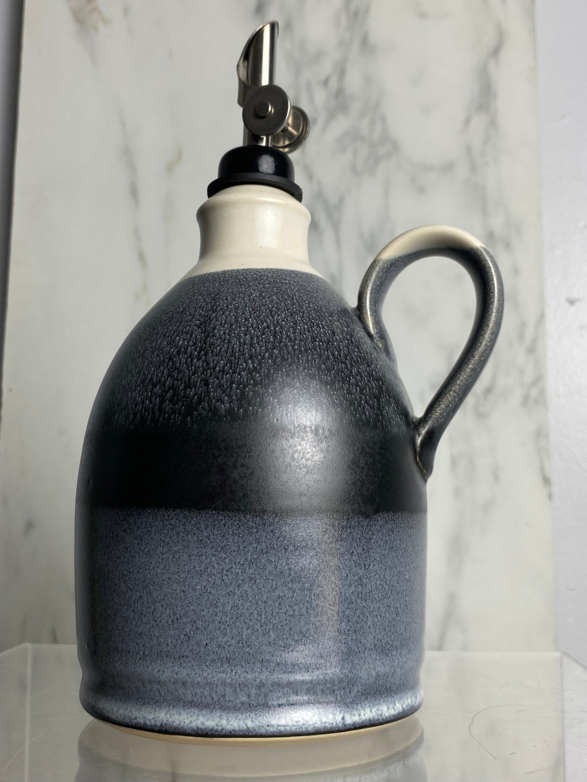 Handmade pottery oil bottle