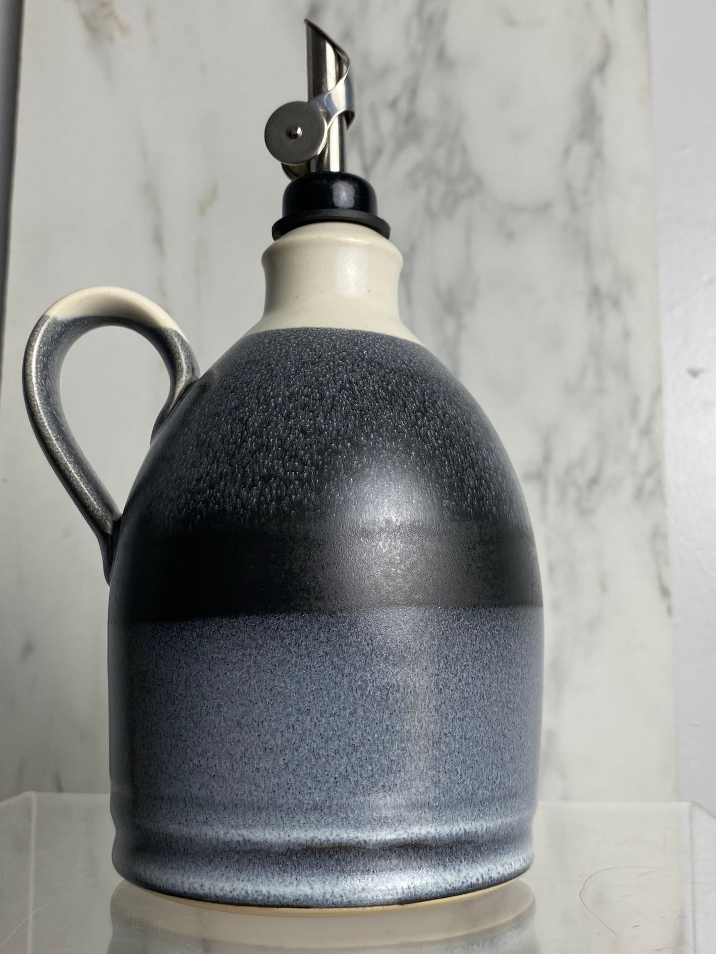 Handmade pottery oil bottle