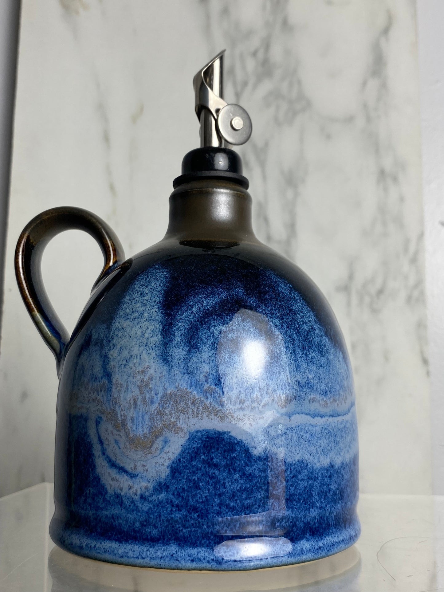 Handmade pottery oil bottle
