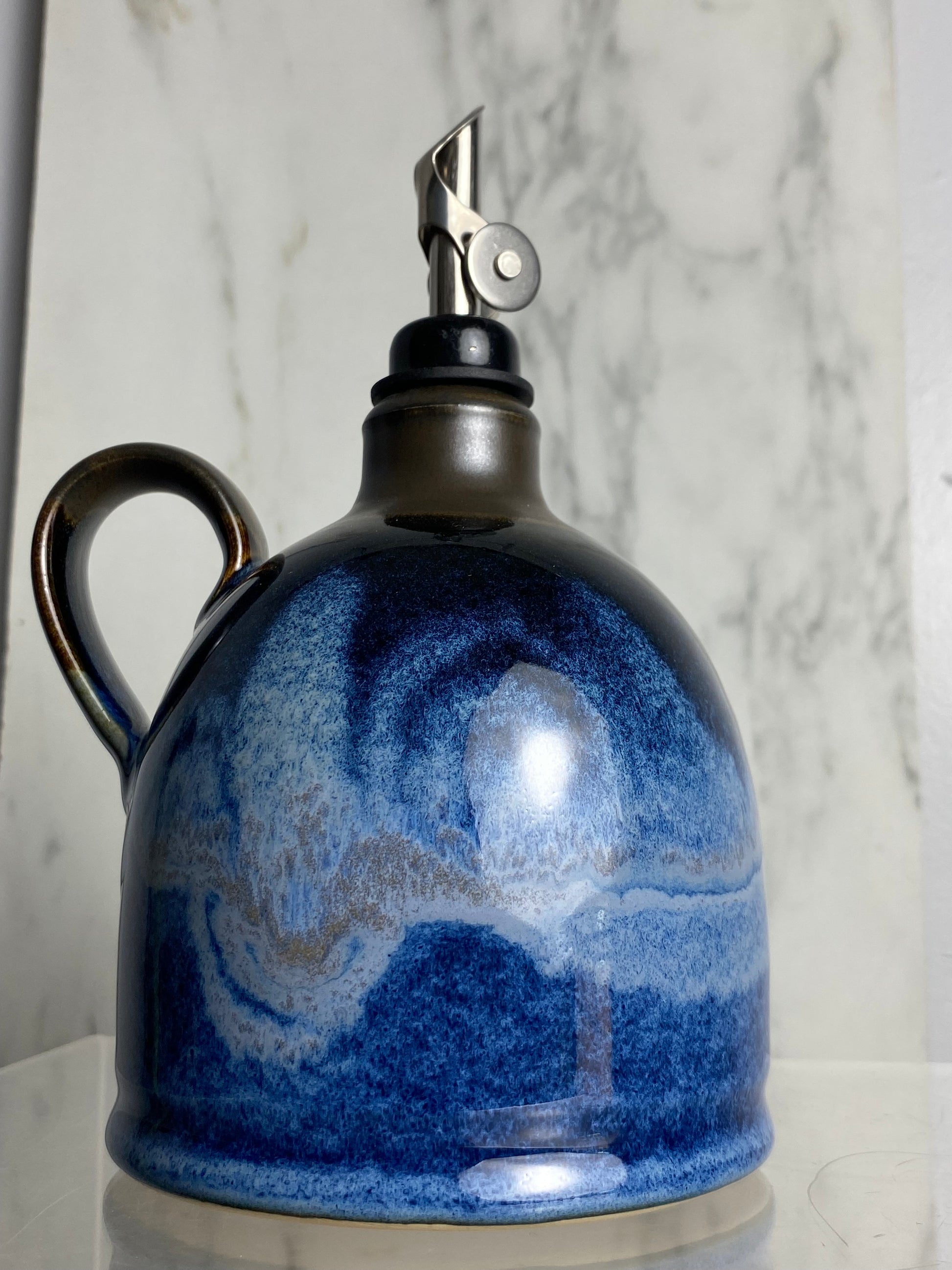 Handmade pottery oil bottle